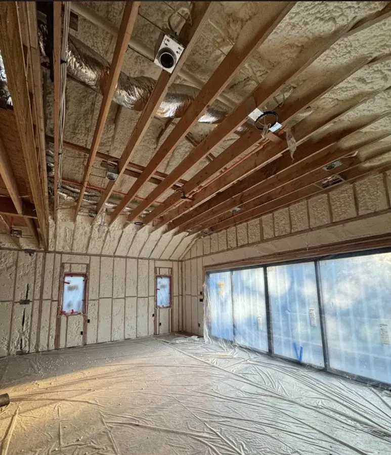 Interior walls and ceiling insulated with spray foam during new construction in Bowie